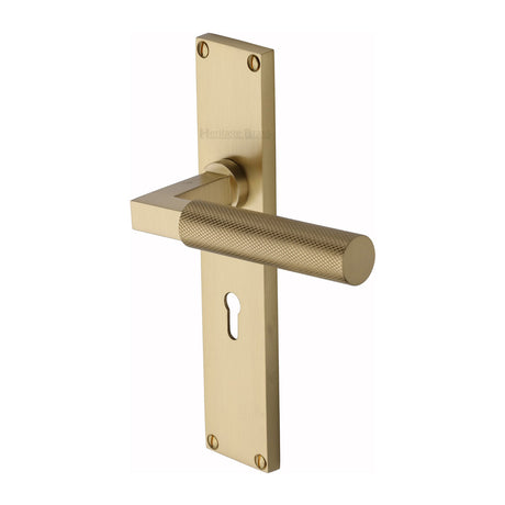 This is an image of a Heritage Brass - Bauhaus Knurled Lever Lock Door Handle on 200mm Plate Satin Brass finish, vt9300-sb that is available to order from Trade Door Handles in Kendal.