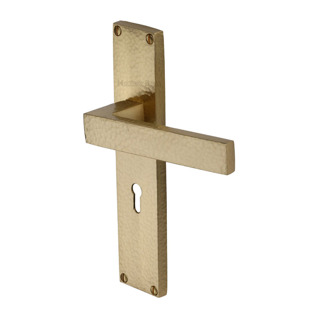 This is an image of a Heritage Brass - Delta Hammered Lever Lock Door Handle on 200mm Plate Satin Brass finish, vth3300-sb that is available to order from Trade Door Handles in Kendal.