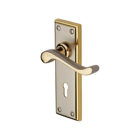 This is an image of a Heritage Brass - Door Handle Lever Lock Edwardian Design Jupiter Finish, w3200-jp that is available to order from Trade Door Handles in Kendal.