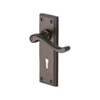 This is an image of a Heritage Brass - Door Handle Lever Lock Edwardian Design Matt Bronze Finish, w3200-mb that is available to order from Trade Door Handles in Kendal.