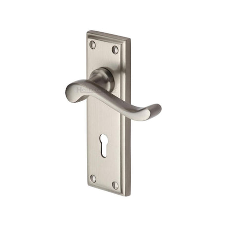 This is an image of a Heritage Brass - Door Handle Lever Lock Edwardian Design Satin Nickel Finish, w3200-sn that is available to order from Trade Door Handles in Kendal.