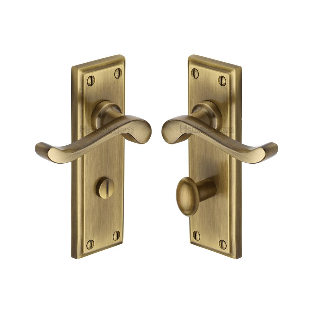 This is an image of a Heritage Brass - Door Handle for Bathroom Edwardian Design Antique Brass Finish, w3220-at that is available to order from Trade Door Handles in Kendal.