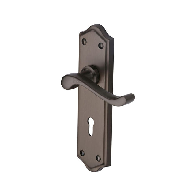 This is an image of a Heritage Brass - Door Handle Lever Lock Buckingham Design Matt Bronze Finish, w4200-mb that is available to order from Trade Door Handles in Kendal.