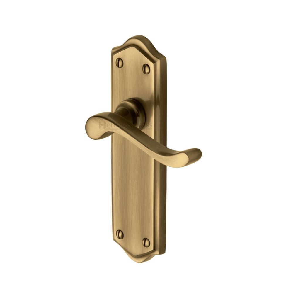 This is an image of a Heritage Brass - Door Handle Lever Latch Buckingham Design Antique Brass Finish, w4210-at that is available to order from Trade Door Handles in Kendal.