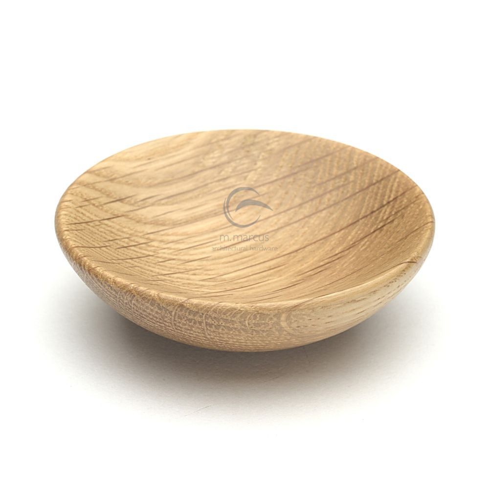 This is an image of a M.Marcus - Wooden Cabinet Knob Bowl Design 65mm Oak Finish, w4328-65-oak that is available to order from Trade Door Handles in Kendal.