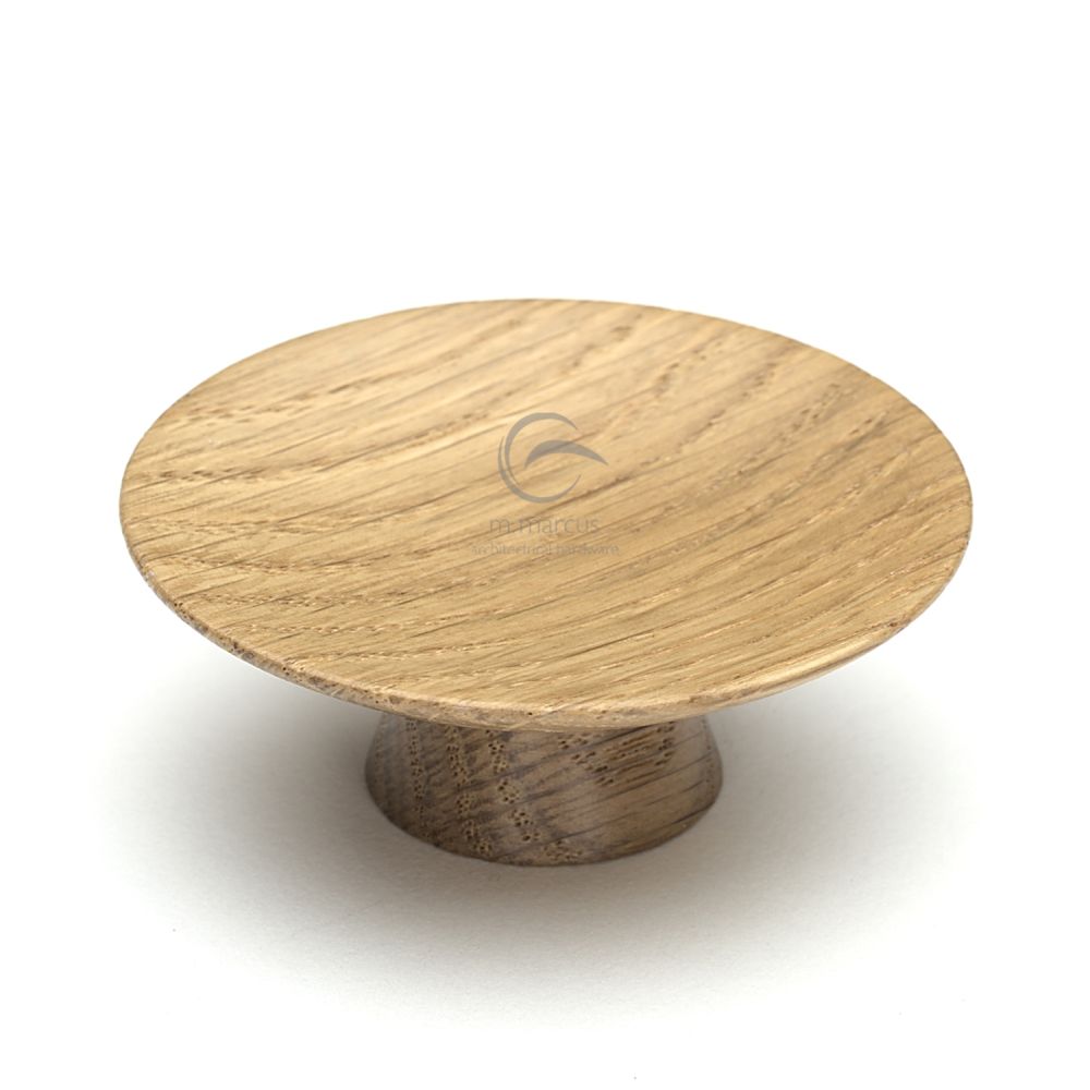 This is an image of a M.Marcus - Wooden Cabinet Knob Convex Design 65mm Oak Finish, w4343-65-oak that is available to order from Trade Door Handles in Kendal.