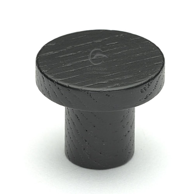 This is an image of a M.Marcus - Wooden Cabinet Knob Round Circum Design 48mm Black Ash Finish, w4470-48-ash that is available to order from Trade Door Handles in Kendal.