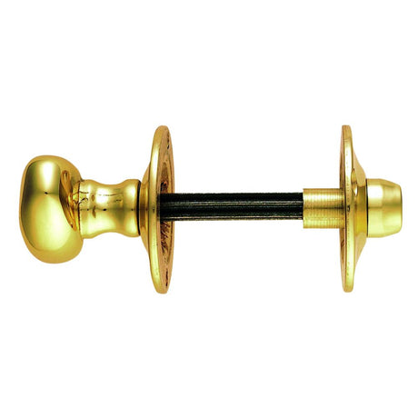 This is an image of a Carlisle Brass - Oval Thumb Turn with Coin Release - Polished Brass that is availble to order from Trade Door Handles in Kendal.