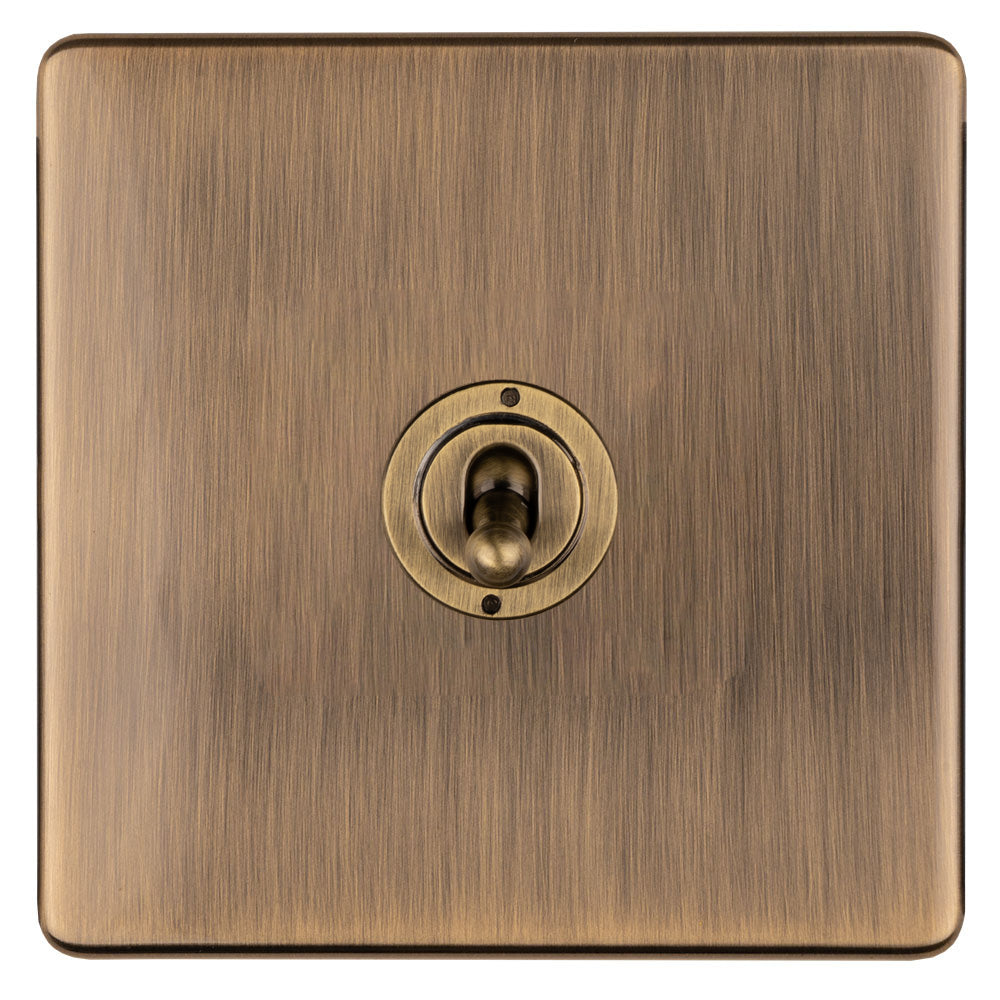 This is an image showing Eurolite 1 Gang 10Amp 2Way Toggle Switch- Antique Brassabt1sw available to order from trade door handles, quick delivery and discounted prices.