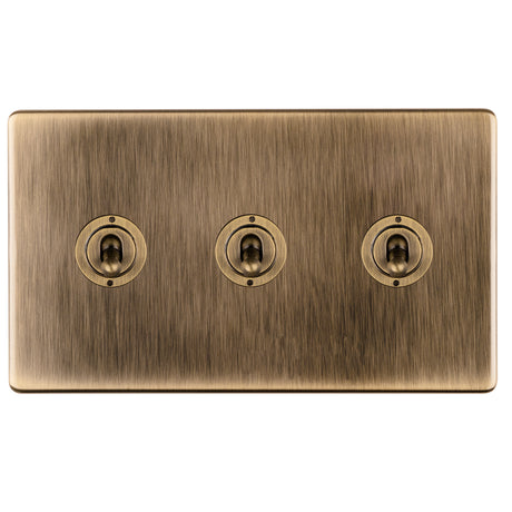 This is an image showing Eurolite 3 Gang 10Amp 2Way Toggle Switch- Antique Brassabt3sw available to order from trade door handles, quick delivery and discounted prices.