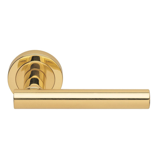 This is an image of a Manital - Calla Lever on Round Rose - Polished Brass that is availble to order from Trade Door Handles in Kendal.