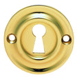 This is an image of a Carlisle Brass - Small Escutcheon - Polished Brass that is availble to order from Trade Door Handles in Kendal.