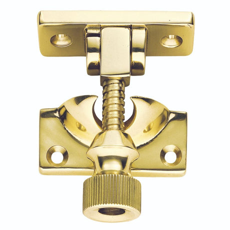 This is an image of a Carlisle Brass - Architectural Quality Brighton Sash Fastener - Polished Brass that is availble to order from Trade Door Handles in Kendal.