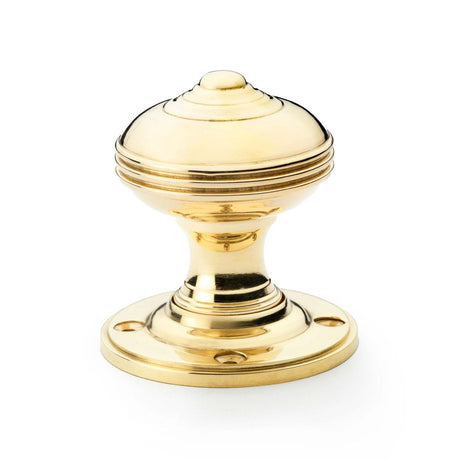 This is an image showing Alexander & Wilks Romeo Mortice Knob - Unlacquered Brass aw304-50-ub available to order from Trade Door Handles in Kendal, quick delivery and discounted prices.