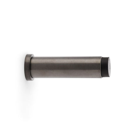 This is an image showing Alexander & Wilks Plain Projection Cylinder Door Stop - Dark Bronze PVD aw601-75-dbzpvd available to order from Trade Door Handles in Kendal, quick delivery and discounted prices.