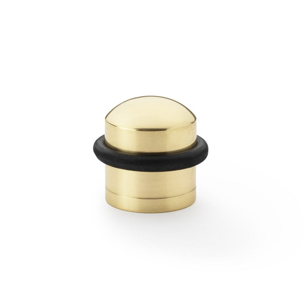 This is an image showing Alexander & Wilks Dome Top Floor Mounted Door Stop - Polished Brass aw638pbl available to order from Trade Door Handles in Kendal, quick delivery and discounted prices.