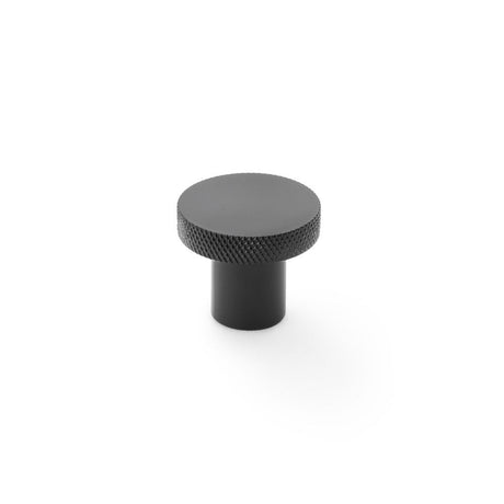 This is an image showing Alexander & Wilks Hanover Knurled Circular Cupboard Knob - Black - 30mm aw802-30-bl available to order from Trade Door Handles in Kendal, quick delivery and discounted prices.