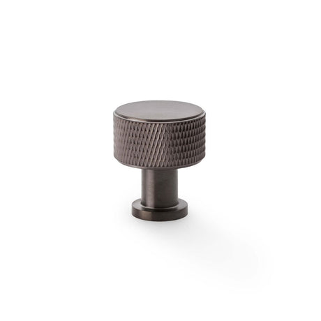 This is an image showing Alexander & Wilks Lucia Knurled Cupboard Knob - Dark Bronze PVD - 29mm aw807k-29-dbzpvd available to order from Trade Door Handles in Kendal, quick delivery and discounted prices.