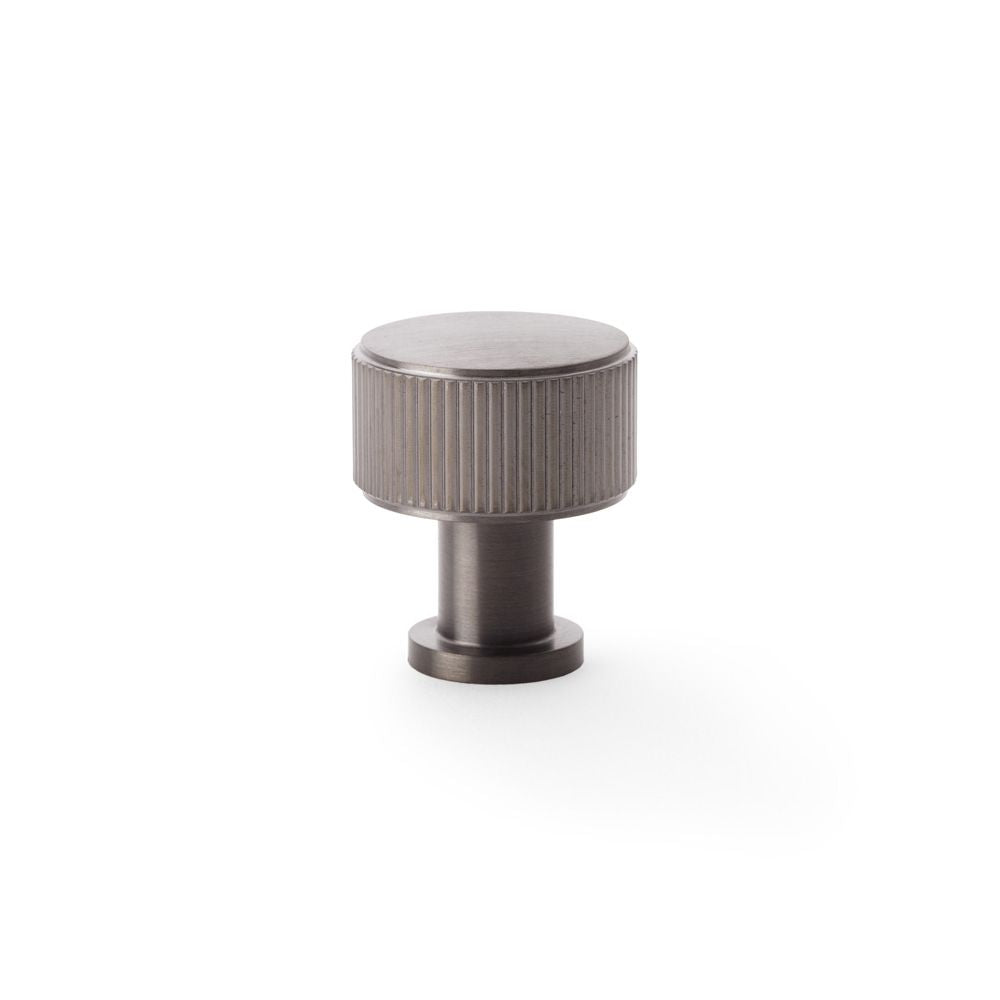 This is an image showing Alexander & Wilks Lucia Reeded Cupboard Knob - Dark Bronze PVD - 29mm aw807r-29-dbzpvd available to order from Trade Door Handles in Kendal, quick delivery and discounted prices.