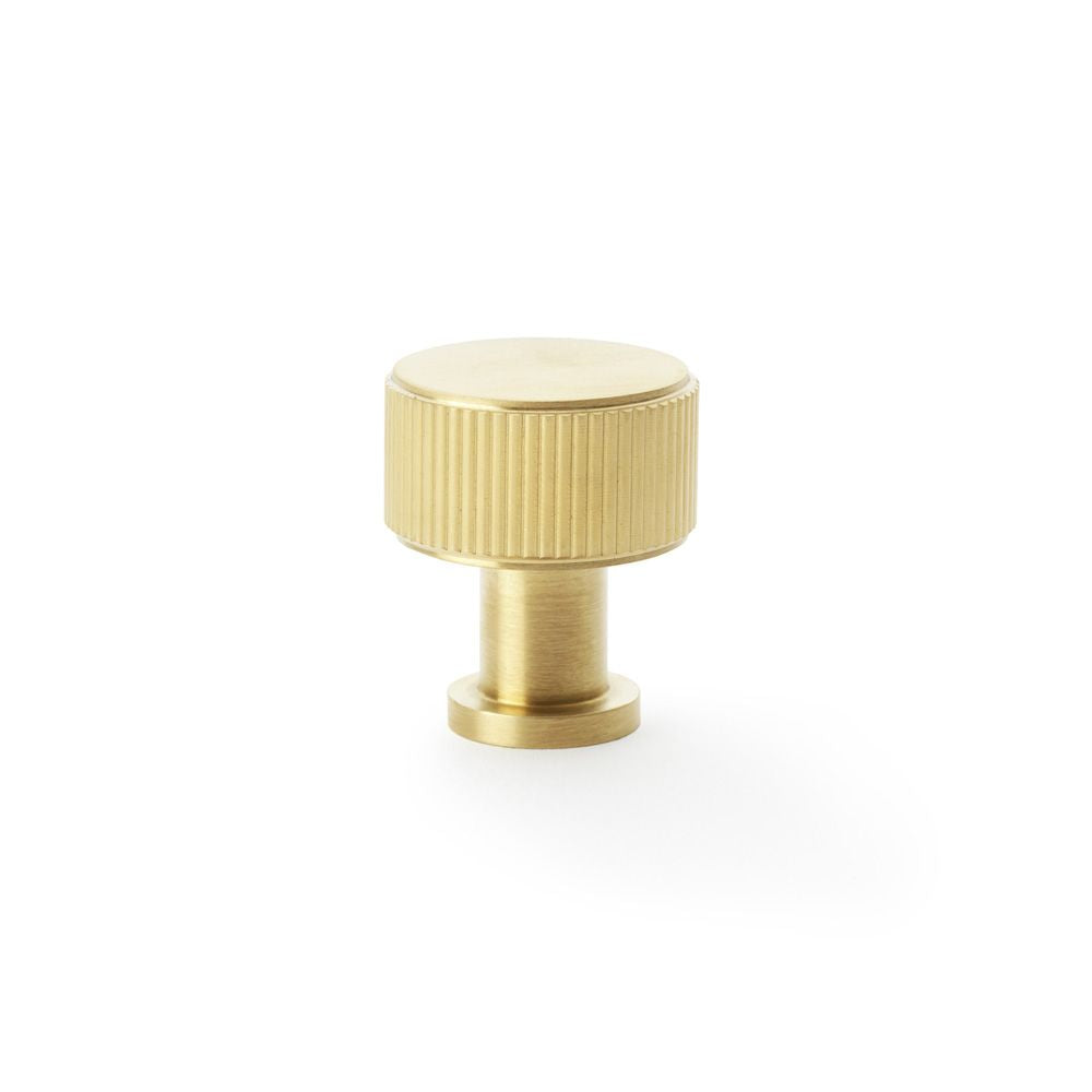 This is an image showing Alexander & Wilks Lucia Reeded Cupboard Knob - Satin Brass PVD - 29mm aw807r-29-sbpvd available to order from Trade Door Handles in Kendal, quick delivery and discounted prices.