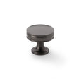 This is an image showing Alexander & Wilks Lynd Cupboard Knob - Dark Bronze - 38mm aw808-38-dbz available to order from Trade Door Handles in Kendal, quick delivery and discounted prices.