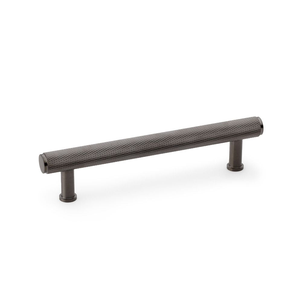 This is an image showing Alexander & Wilks Crispin Knurled T-bar Cupboard Pull Handle - Dark Bronze PVD - Centres 128mm aw809-128-dbzpvd available to order from Trade Door Handles in Kendal, quick delivery and discounted prices.