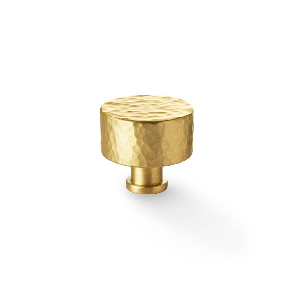 This is an image showing Alexander & Wilks Leila Hammered Cupboard Knob - Satin Brass - 35mm aw816-35-sb available to order from Trade Door Handles in Kendal, quick delivery and discounted prices.