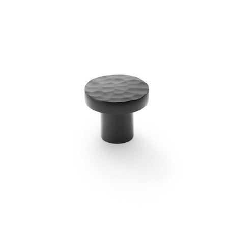 This is an image showing Alexander & Wilks Hanover Hammered Cupboard Knob - Black - 30mm aw820-30-bl available to order from Trade Door Handles in Kendal, quick delivery and discounted prices.