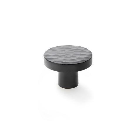 This is an image showing Alexander & Wilks Hanover Hammered Cupboard Knob - Black - 38mm aw820-38-bl available to order from Trade Door Handles in Kendal, quick delivery and discounted prices.