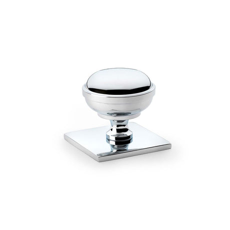 This is an image showing Alexander & Wilks Quantock Cupboard Knob on Square Backplate - Polished Chrome - 34mm aw826-34-pc available to order from Trade Door Handles in Kendal, quick delivery and discounted prices.