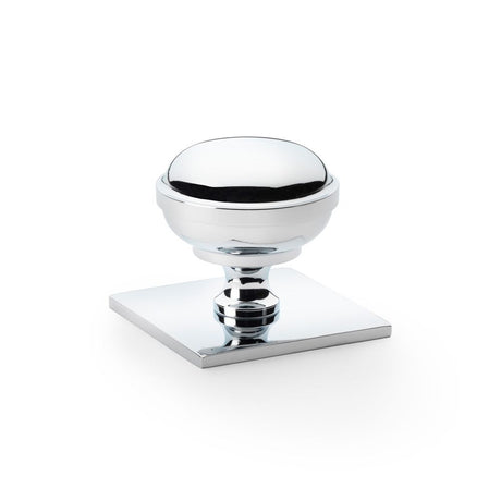 This is an image showing Alexander & Wilks Quantock Cupboard Knob on Square Backplate - Polished Chrome - 38mm aw826-38-pc available to order from Trade Door Handles in Kendal, quick delivery and discounted prices.