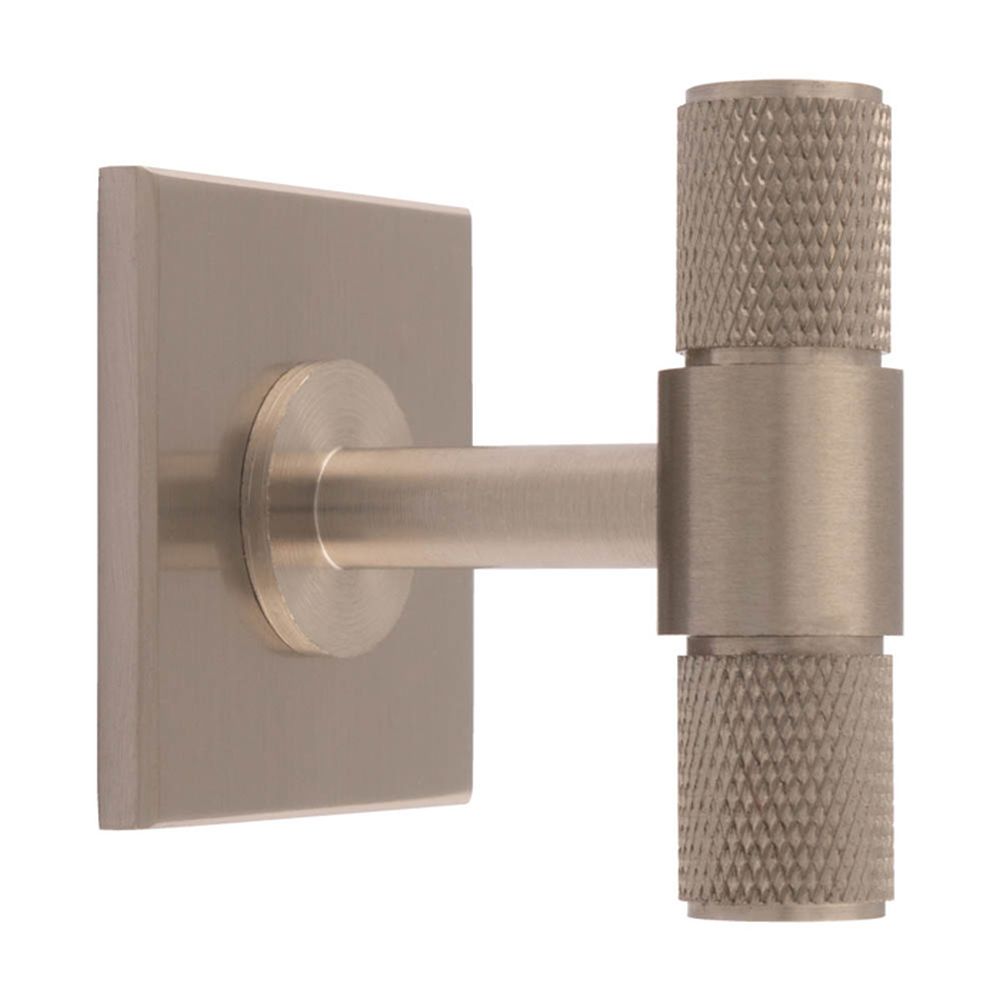 This is an image of a Carlisle Brass - Knurled T-Bar on backplate that is availble to order from Trade Door Handles in Kendal.