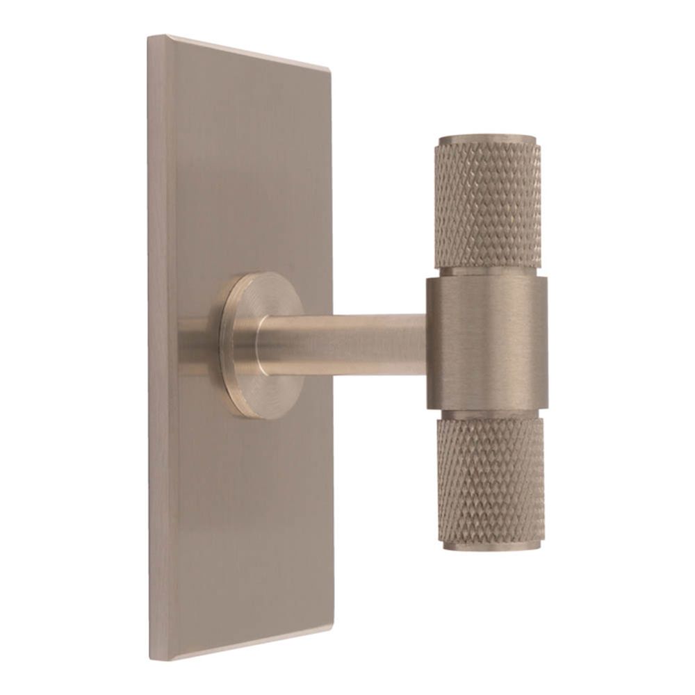 This is an image of a Carlisle Brass - Knurled T-Bar on backplate that is availble to order from Trade Door Handles in Kendal.