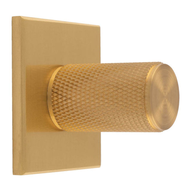 This is an image of a Carlisle Brass - Knurled Cylinder Knob on backplate that is availble to order from Trade Door Handles in Kendal.