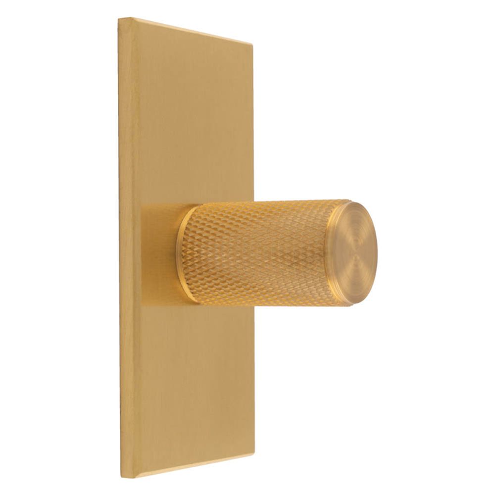 This is an image of a Carlisle Brass - Knurled Cylinder Knob on backplate that is availble to order from Trade Door Handles in Kendal.