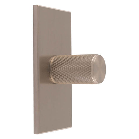 This is an image of a Carlisle Brass - Knurled Cylinder Knob on backplate that is availble to order from Trade Door Handles in Kendal.