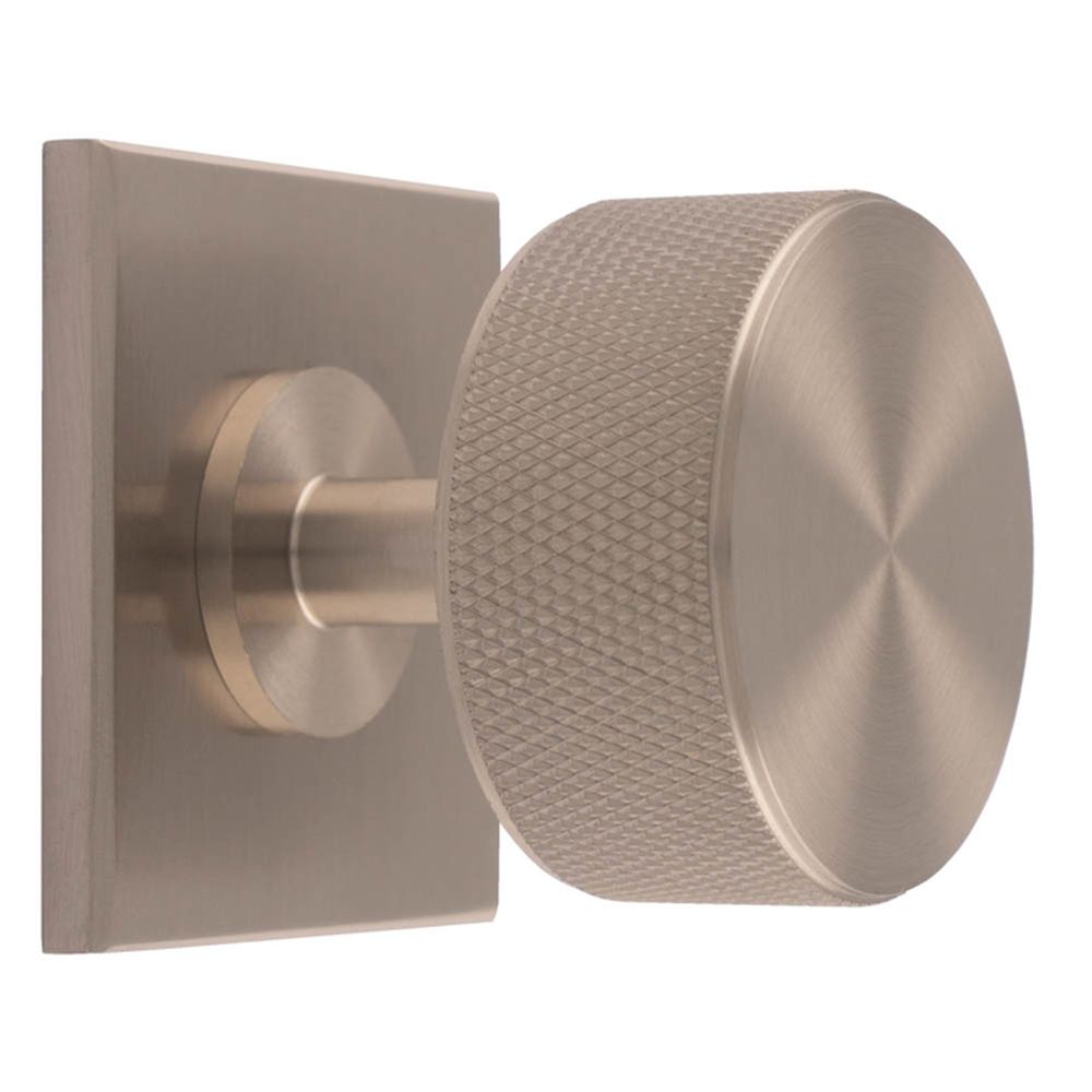 This is an image of a Carlisle Brass - Knurled Radio Knob on Backplate that is availble to order from Trade Door Handles in Kendal.