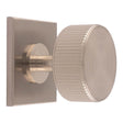 This is an image of a Carlisle Brass - Lines Radio Knob on Backplate that is availble to order from Trade Door Handles in Kendal.