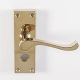 This is an image of a Carlisle Brass - Contract Victorian Scroll Lever on Privacy Backplate - Polished that is availble to order from Trade Door Handles in Kendal.