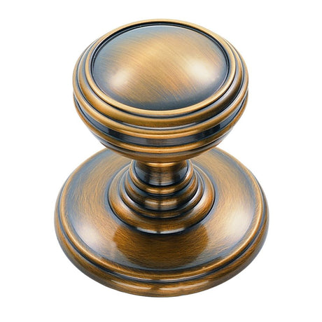 This is an image of a Delamain - Plain Knob 25mm - Florentine Bronze that is availble to order from Trade Door Handles in Kendal.