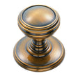 This is an image of a Delamain - Plain Knob 30mm - Florentine Bronze that is availble to order from Trade Door Handles in Kendal.