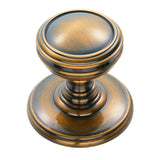 This is an image of a Delamain - Plain Knob 30mm - Florentine Bronze that is availble to order from Trade Door Handles in Kendal.