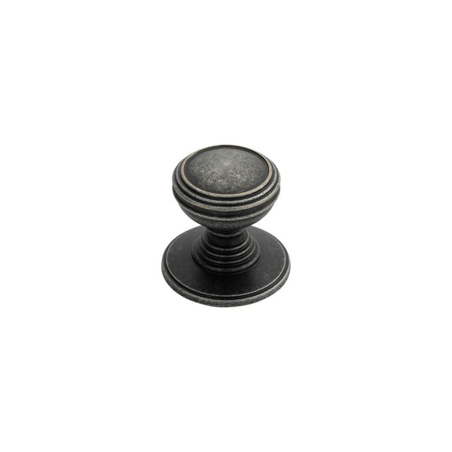 This is an image of a Delamain - Plain Knob 30mm - Pewter that is availble to order from Trade Door Handles in Kendal.