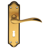 This is an image of a Carlisle Brass - Madrid Lever on Lock Backplate - Florentine Bronze that is availble to order from Trade Door Handles in Kendal.