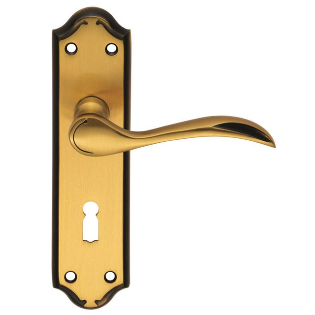 This is an image of a Carlisle Brass - Madrid Lever on Lock Backplate - Florentine Bronze that is availble to order from Trade Door Handles in Kendal.