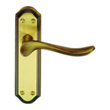 This is an image of a Carlisle Brass - Lytham Lever on Latch backplate - Florentine Bronze that is availble to order from Trade Door Handles in Kendal.