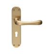 This is an image of a Manital - Ibra Lever on Lock Backplate - Satin Brass that is availble to order from Trade Door Handles in Kendal.