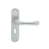 This is an image of a Manital - Ibra Lever on Lock Backplate - Satin Chrome that is availble to order from Trade Door Handles in Kendal.