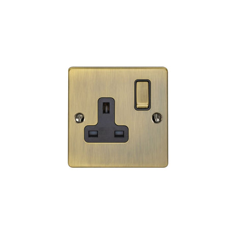 This is an image showing Eurolite Enhance Decorative 1 Gang Socket - Antique Brass (With Black Trim) en1soabb available to order from trade door handles, quick delivery and discounted prices.