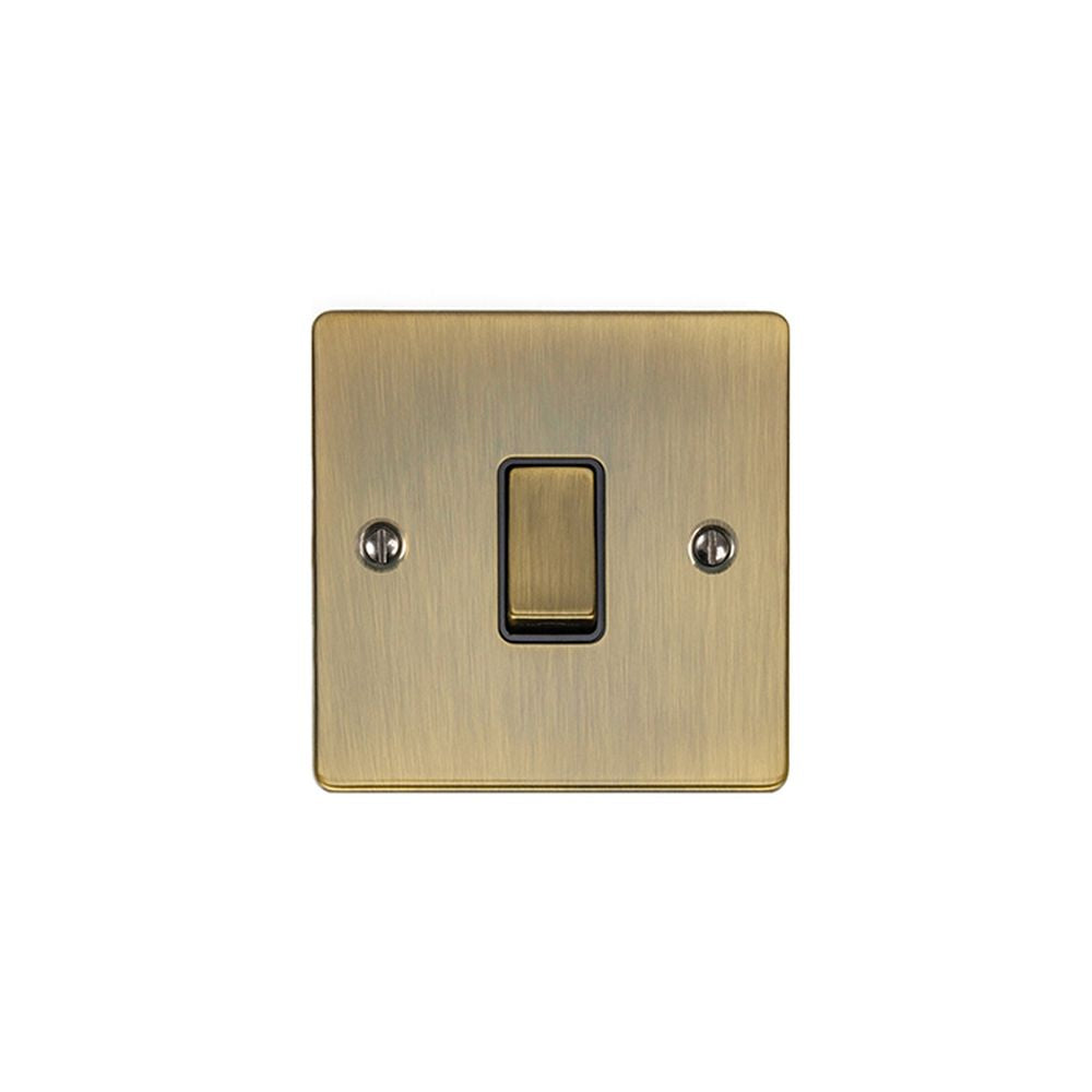 This is an image showing Eurolite Enhance Decorative 1 Gang Switch - Antique Brass (With Black Trim) en1swabb available to order from trade door handles, quick delivery and discounted prices.